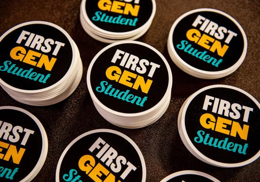 Piles of first-gen student stickers