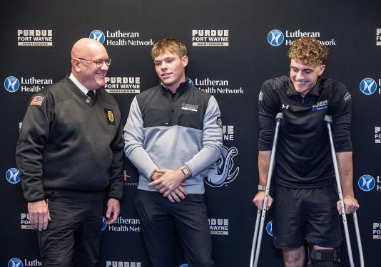 Fort Wayne Fire Department Chief Eric Lahey, PFW golfers Landon Smith and A.J. Agnew