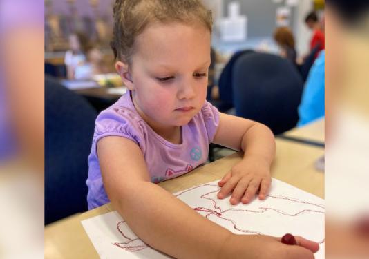 young child coloring