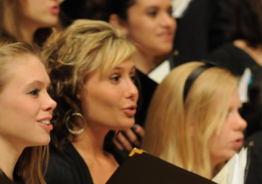 women singing in group