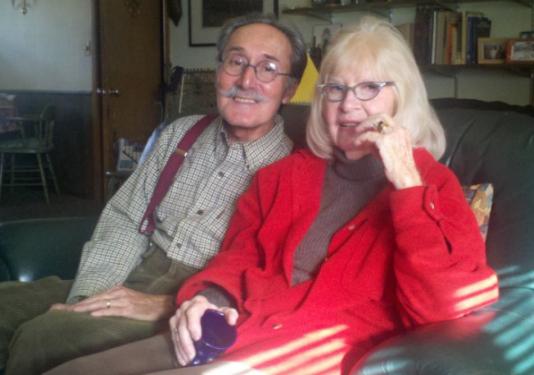 old couple sitting on couch