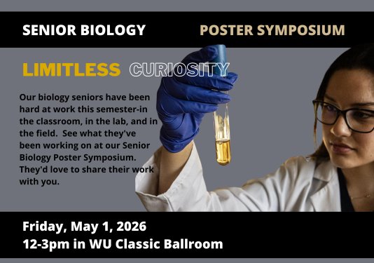 Biology student in lab coat holding test tube