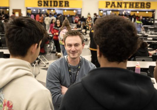 Trevor Helmkamp is speaking to high school students
