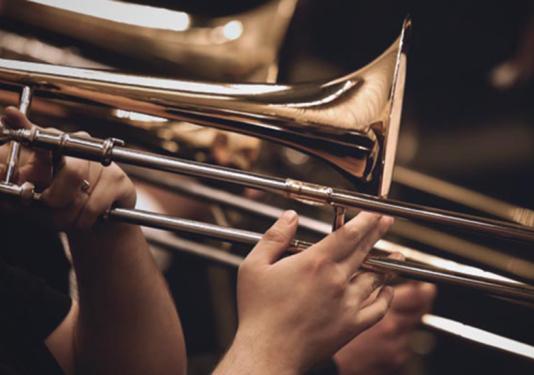 trombone players performing