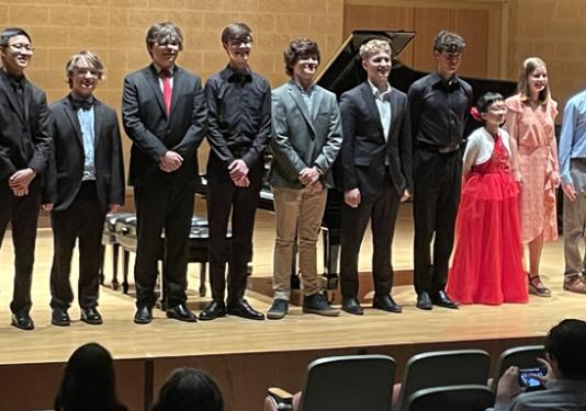 group of students on stage