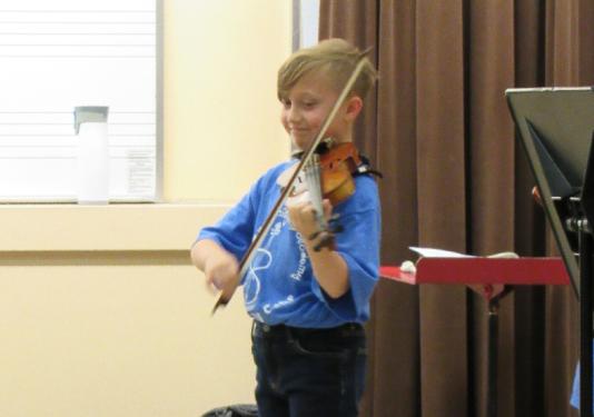 young you playing violin