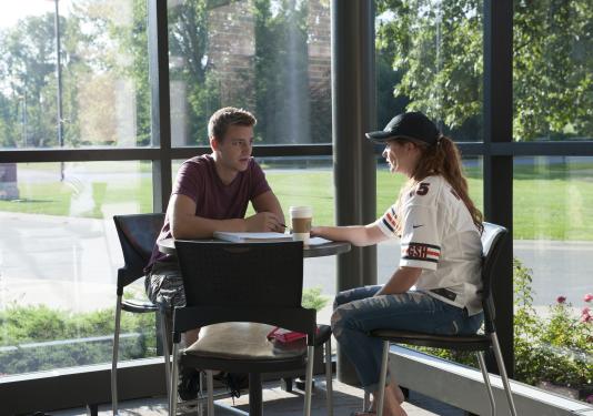 Two students having a conversation
