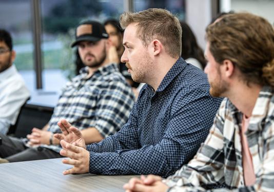Students attending a discussion.