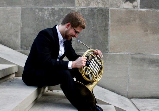 man with french horn