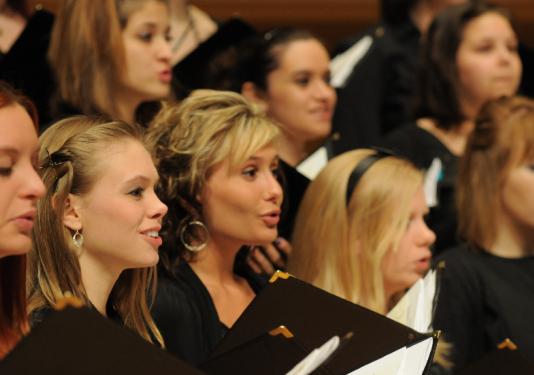 women singing in group