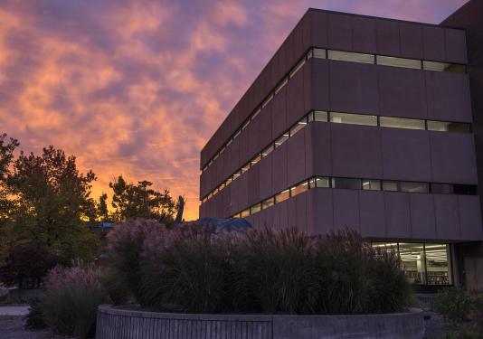 Sunrise on campus with the Helmke library in view.