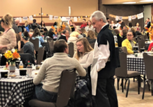 Chancellor Elsenbaumer visit with students at 2nd annual ChiliFest