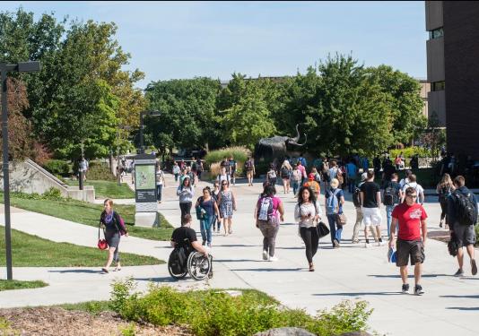 Students fill Mastodon Way when classes are over.