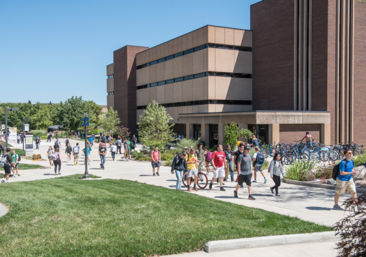 Students walking past Helmke Library