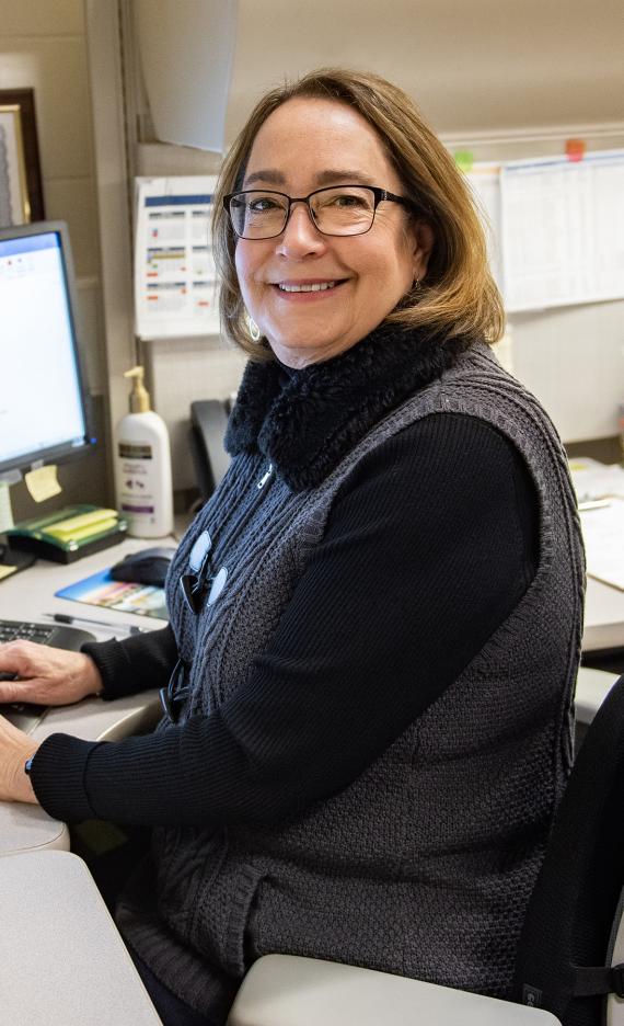 Jana Lese is working at her desk