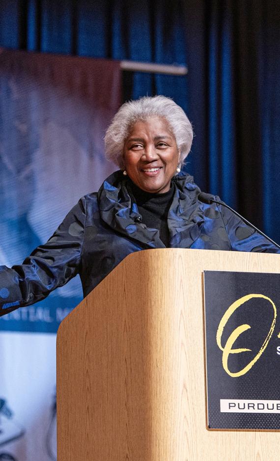 Donna Brazile is speaking onstage in the Auer Performance Hall