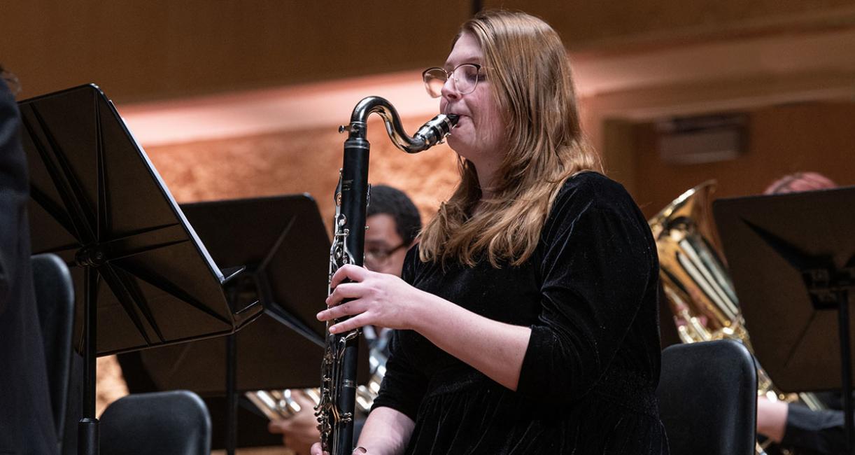 A student plays a bass clarinet in the Symphonic Wind Ensemble.