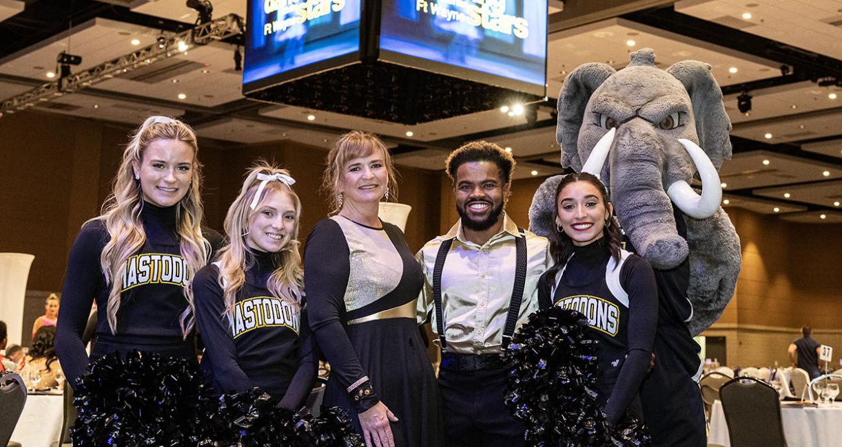 Kim Grannan, PFW cheerleaders, and Don the Mastodon