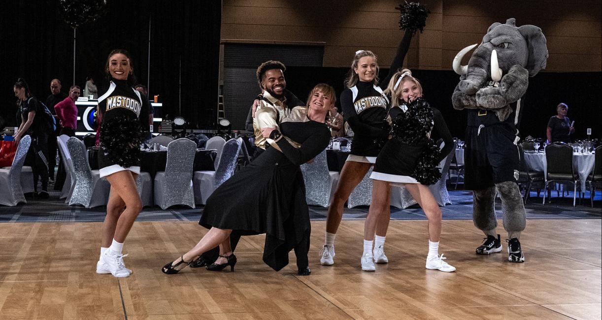 Kim Grannan, PFW cheerleaders, and Don the Mastodon