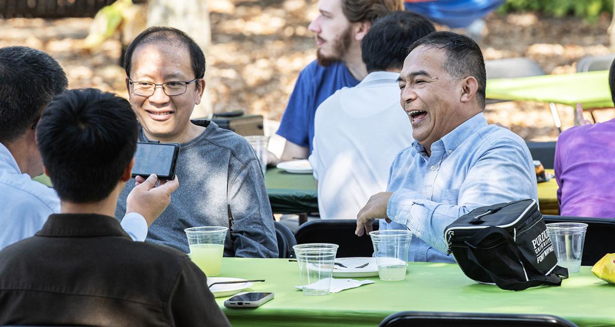 Sharing a laugh or two at the Mastodon Family Picnic.