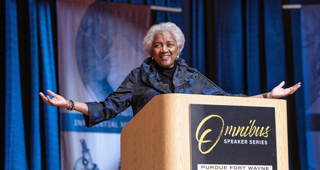 Donna Brazile is speaking onstage in the Auer Performance Hall