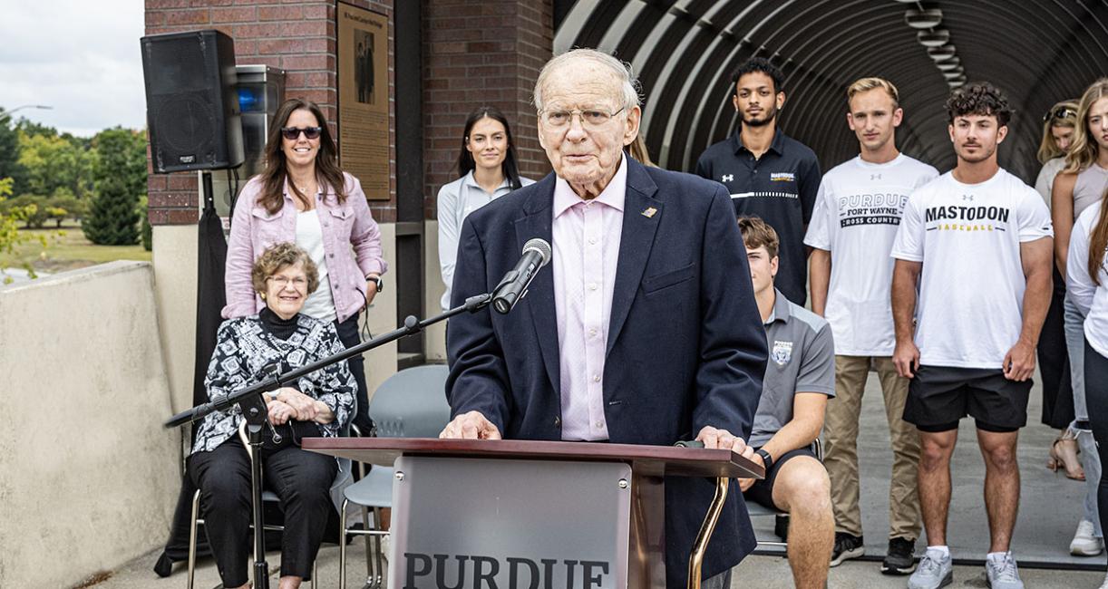 Paul Wolf speaks at the bridge dedication ceremony