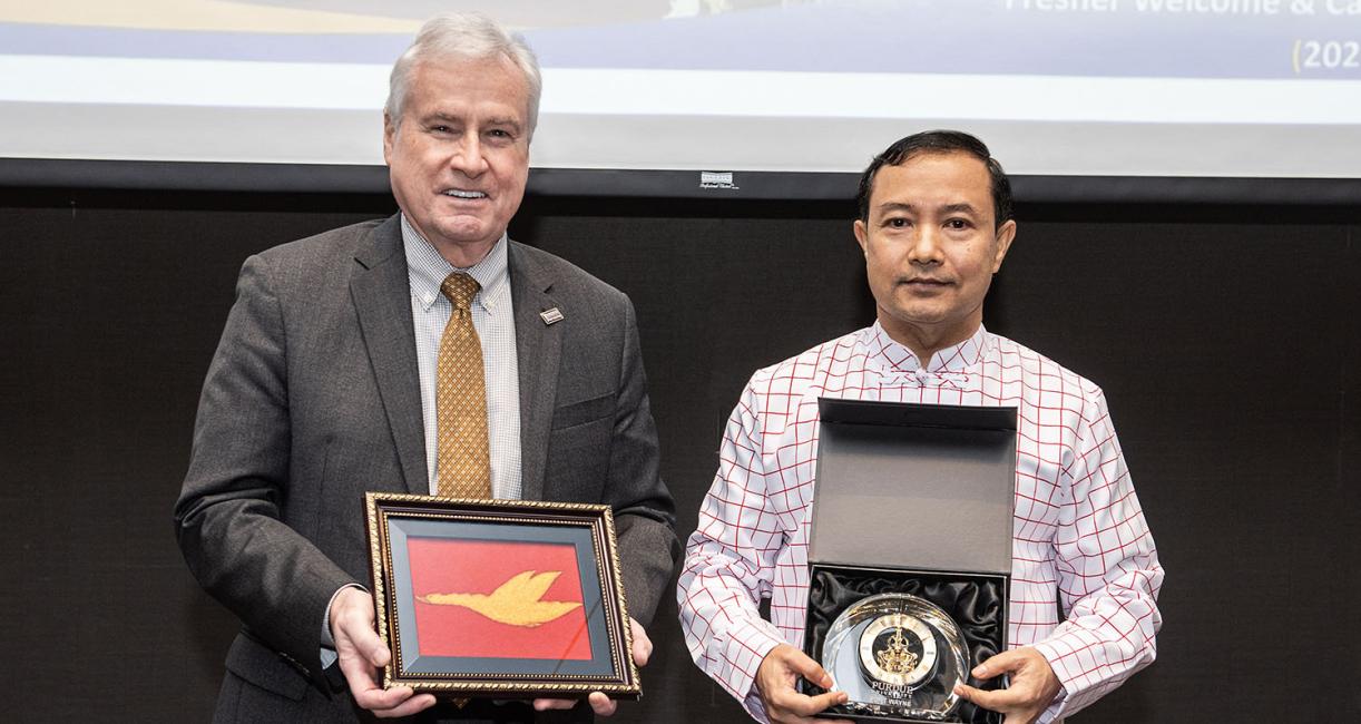 Ron Elsenbaumer, chancellor of Purdue University Fort Wayne, and Pon Nya Mon, chancellor of Mon National University.