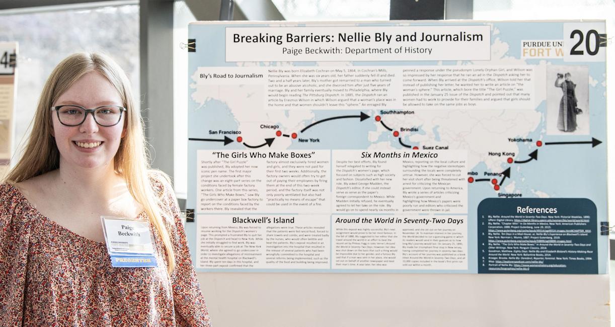 Paige Beckwith and her research poster