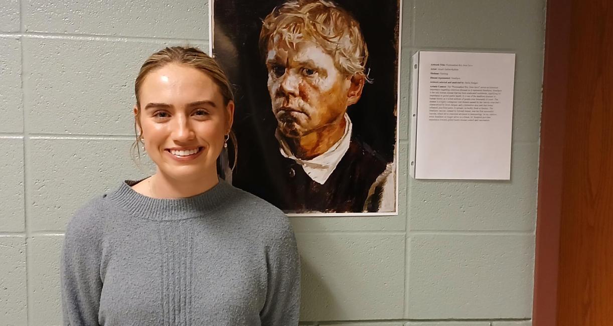 Bella Hodges showcased her smallpox research using the painting “The Pockmarked Boy from Savo.”