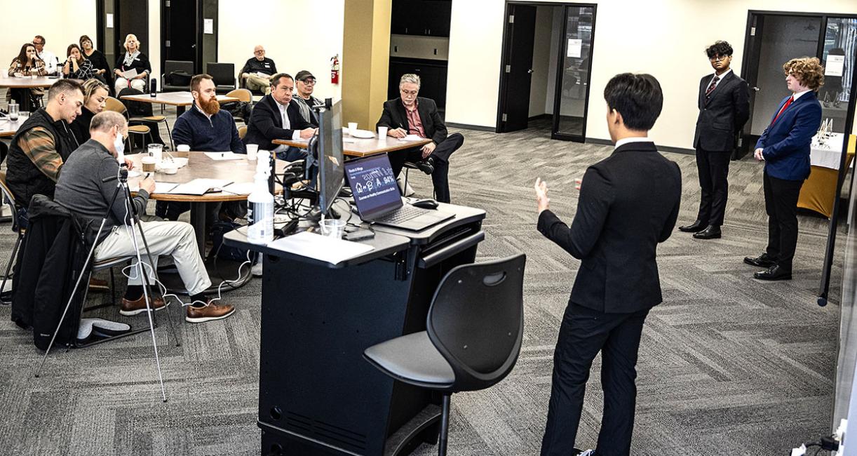 A student is making a business pitch