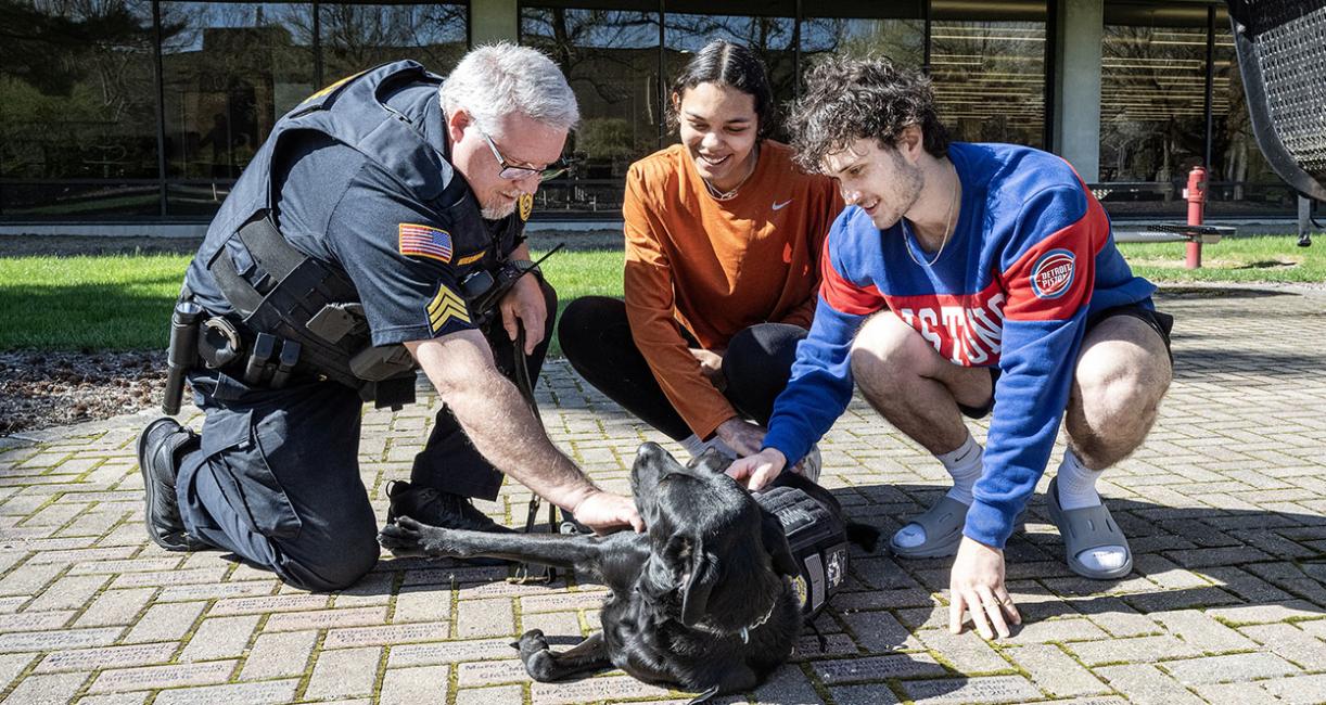 Sgt. Rick Wiegmann, junior Chanell Johnson, and junior Brady Henline get acquainted with Recon.