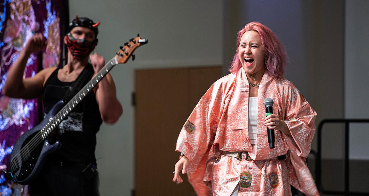 A band is performing at the Cherry Blossom Festival