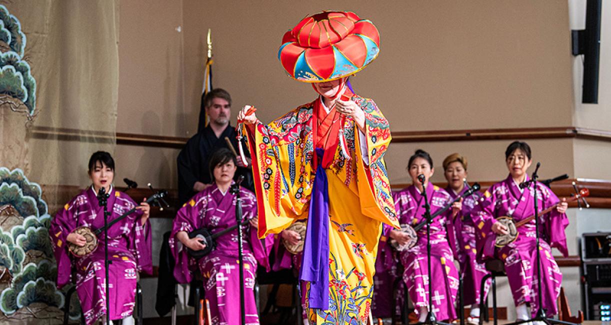 A dancer and musicians at the Cherry Blossom Festival
