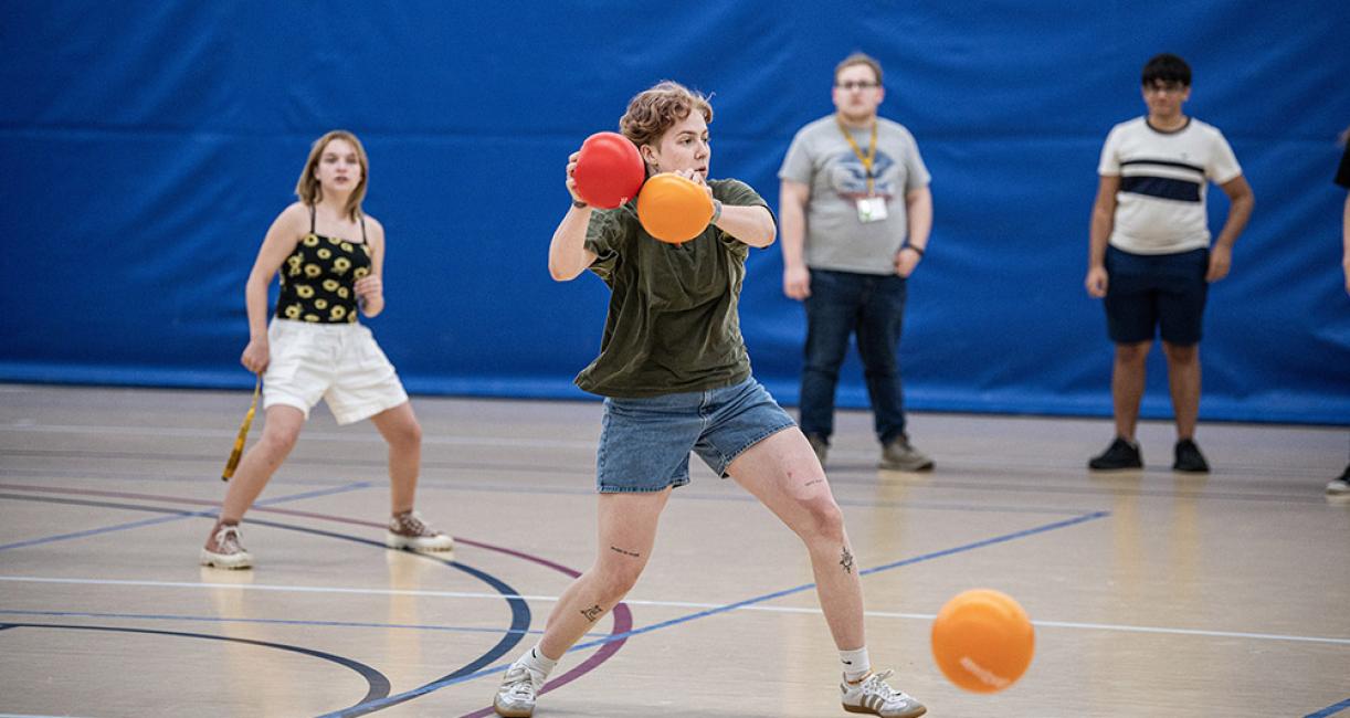 Students are playing dodgeball at NSO orientation