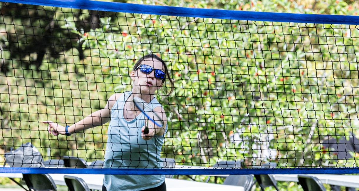 Student playing volleyball at RecFest