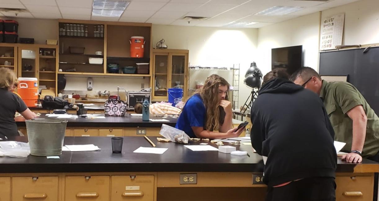 Students in the anthropology lab reviewing results