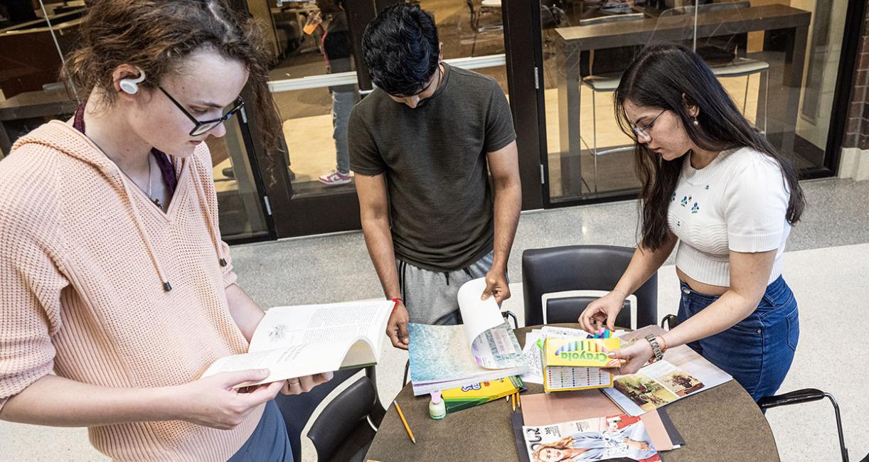Two students are crafting