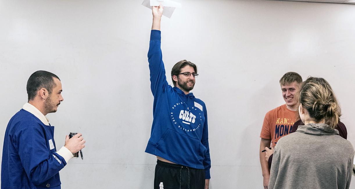 A student is giving a history class presentation