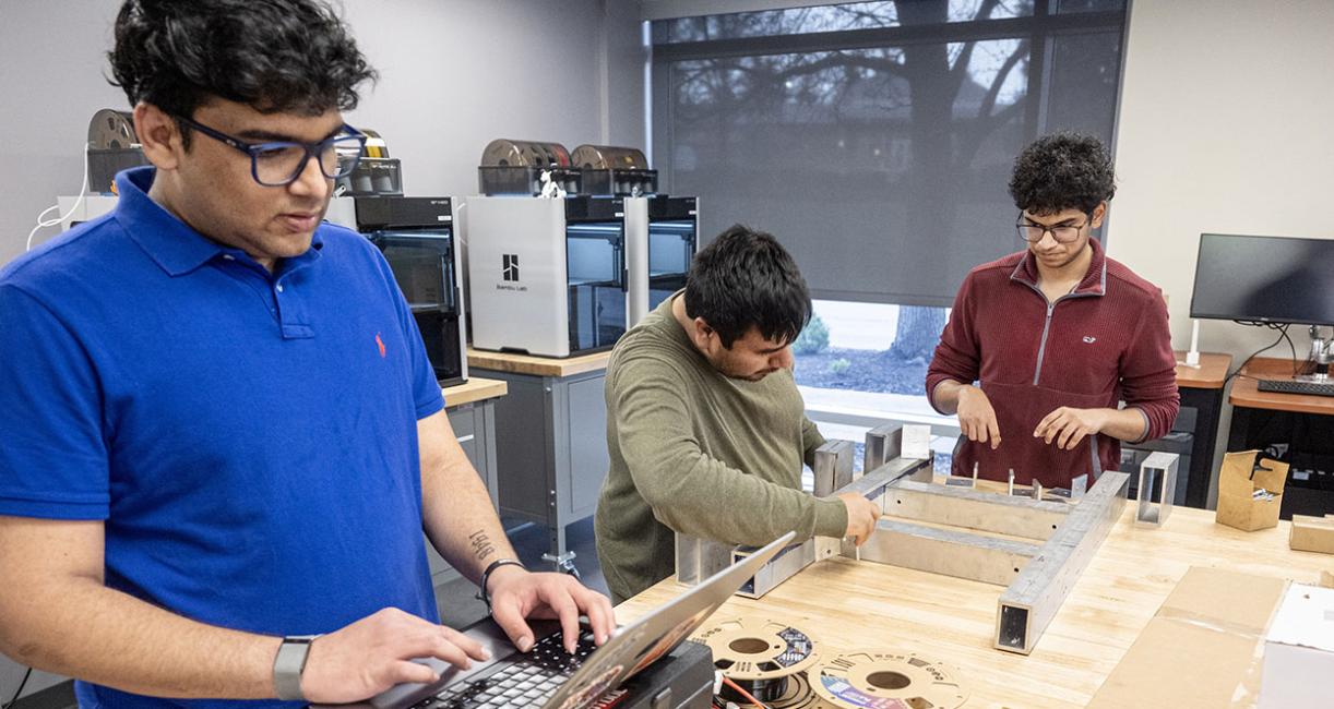 Members of the Lunabotics team are working on their project