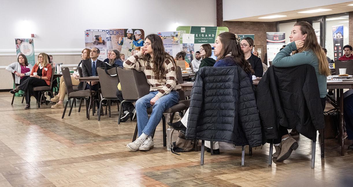 A group of students is attending a conference