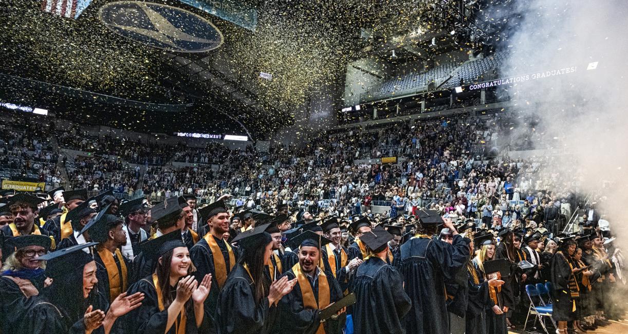 Students celebrate with confetti at the end of the 2026 commencement ceremony