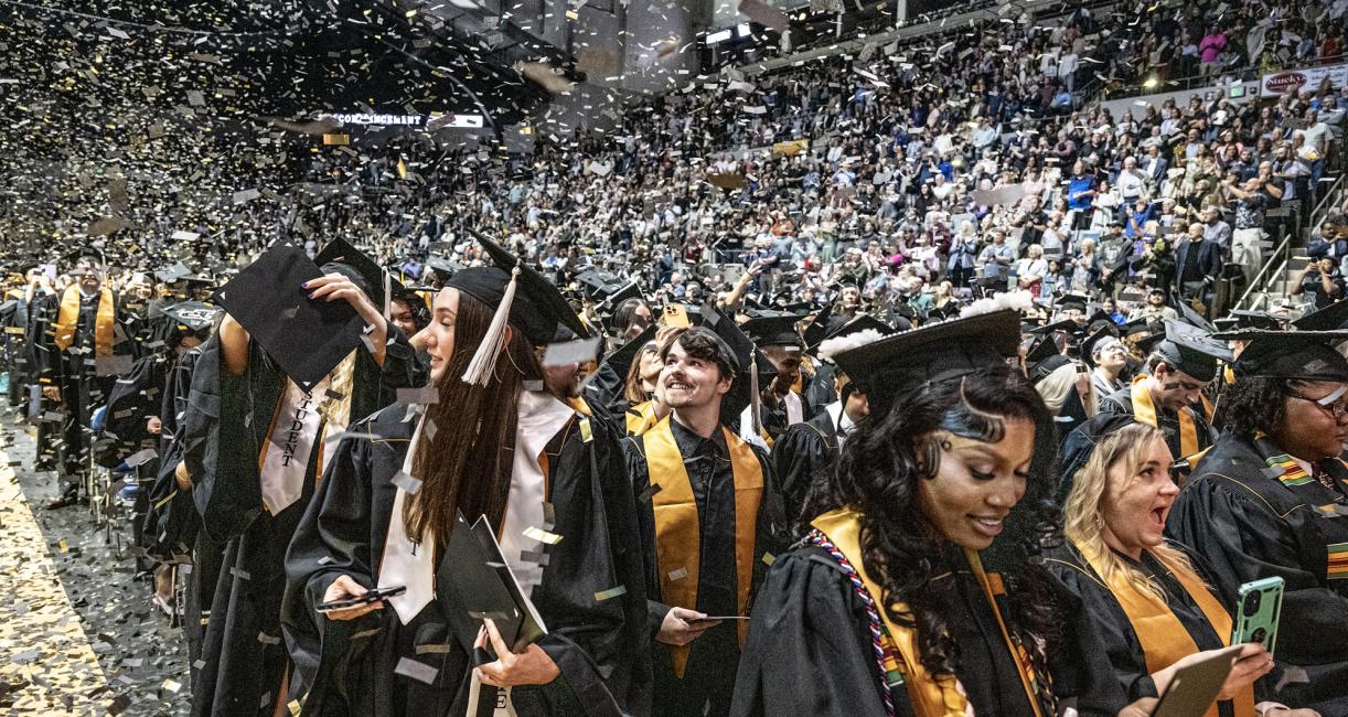 Students celebrate at the end of the 2026 commencement ceremony