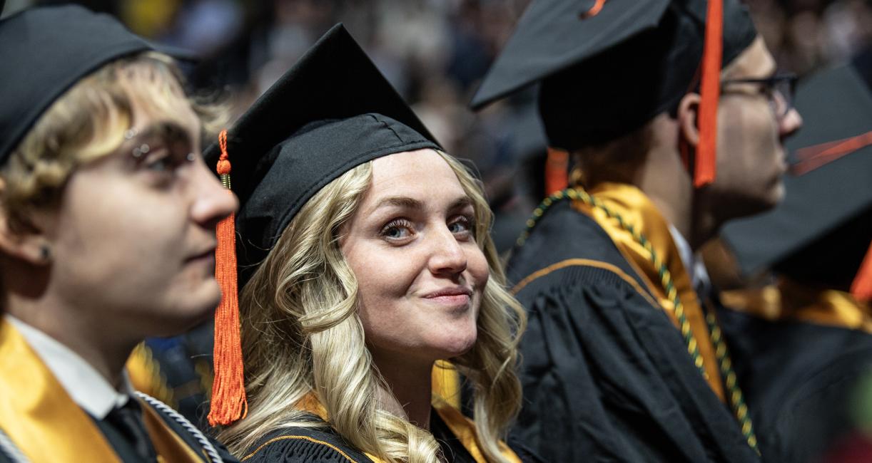 A student catches the camera at the 2026 commencement ceremony