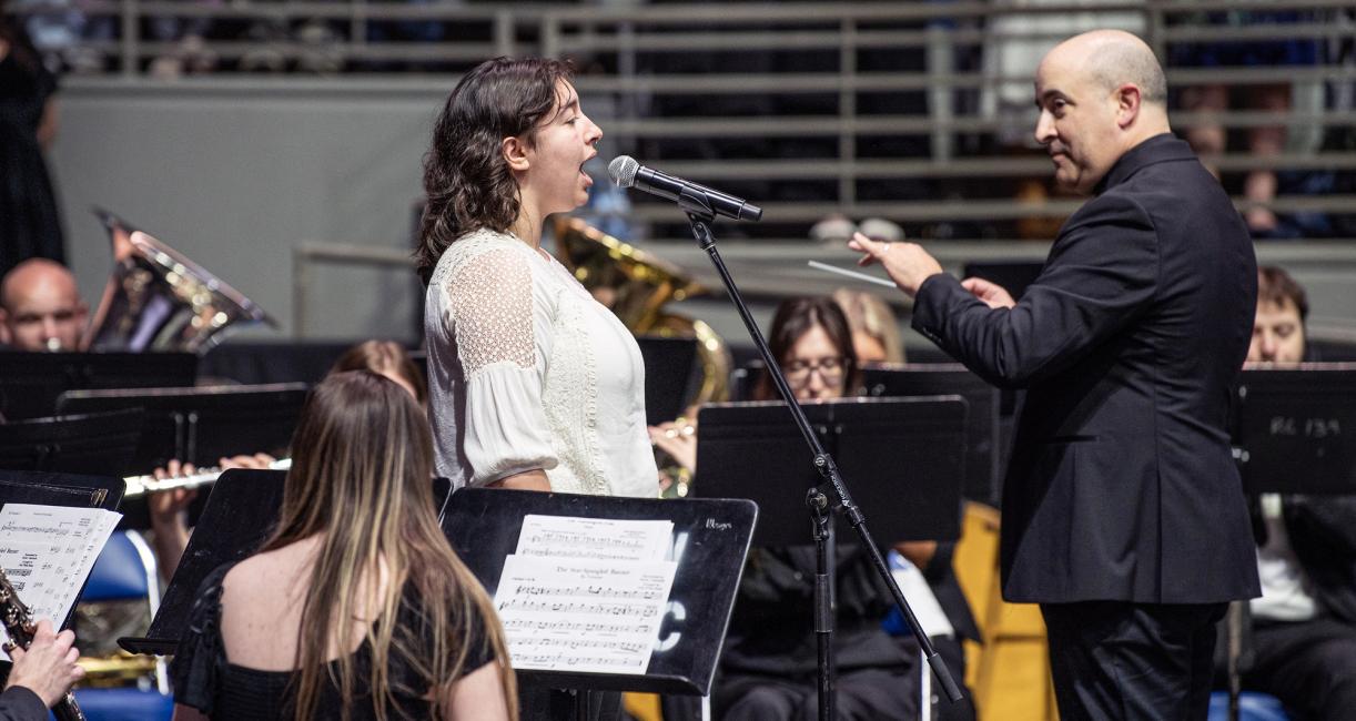 A performer sings at the 2026 commencement ceremony