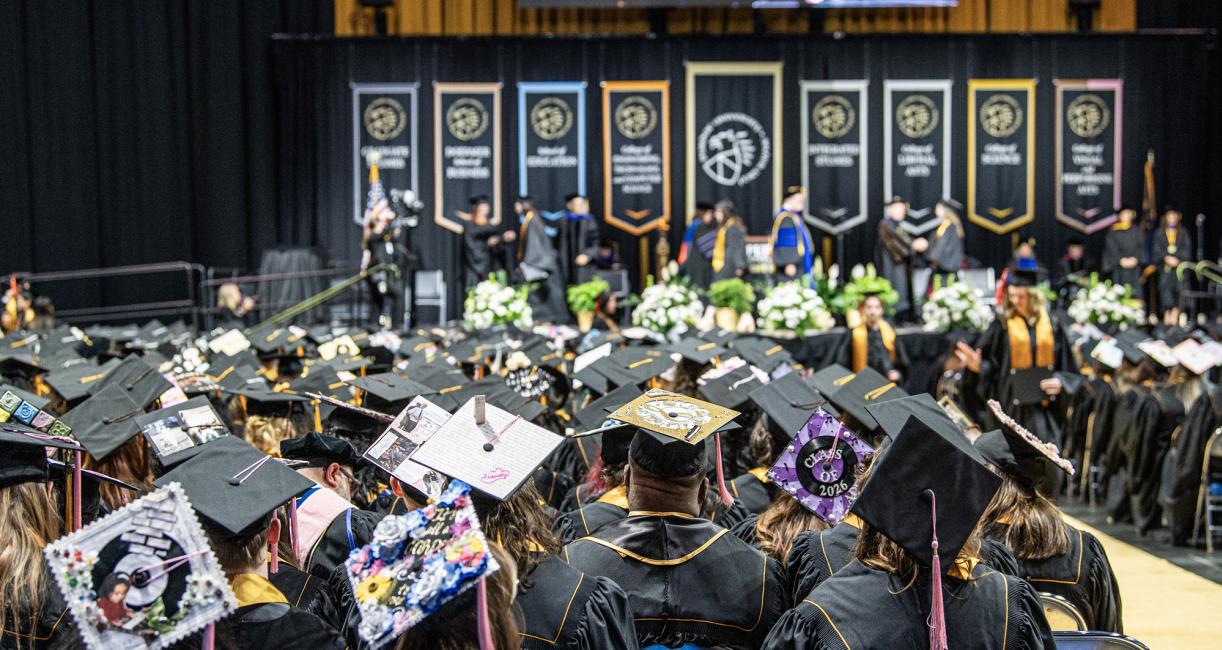 A view of the 2026 commencement ceremony stage from a student's perspective